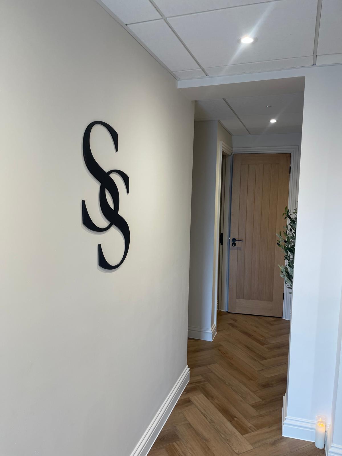 The Sorella & Soul monogram in the hallway